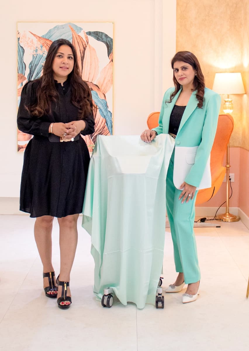 Dermapuritys staff team celebration with flowers and cake