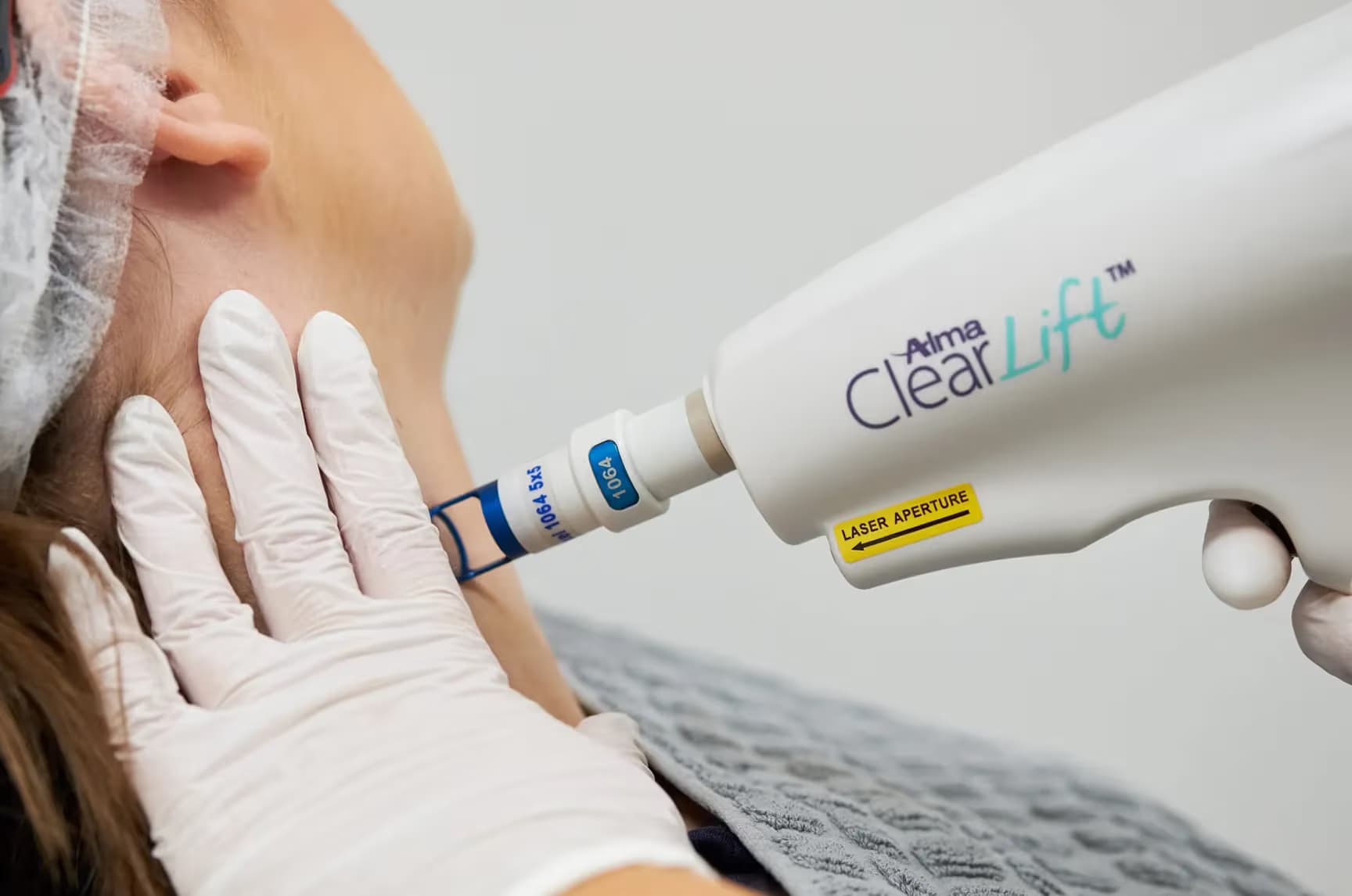 Anti-aging treatments demonstration showing a woman's face with circular callouts highlighting different skin areas