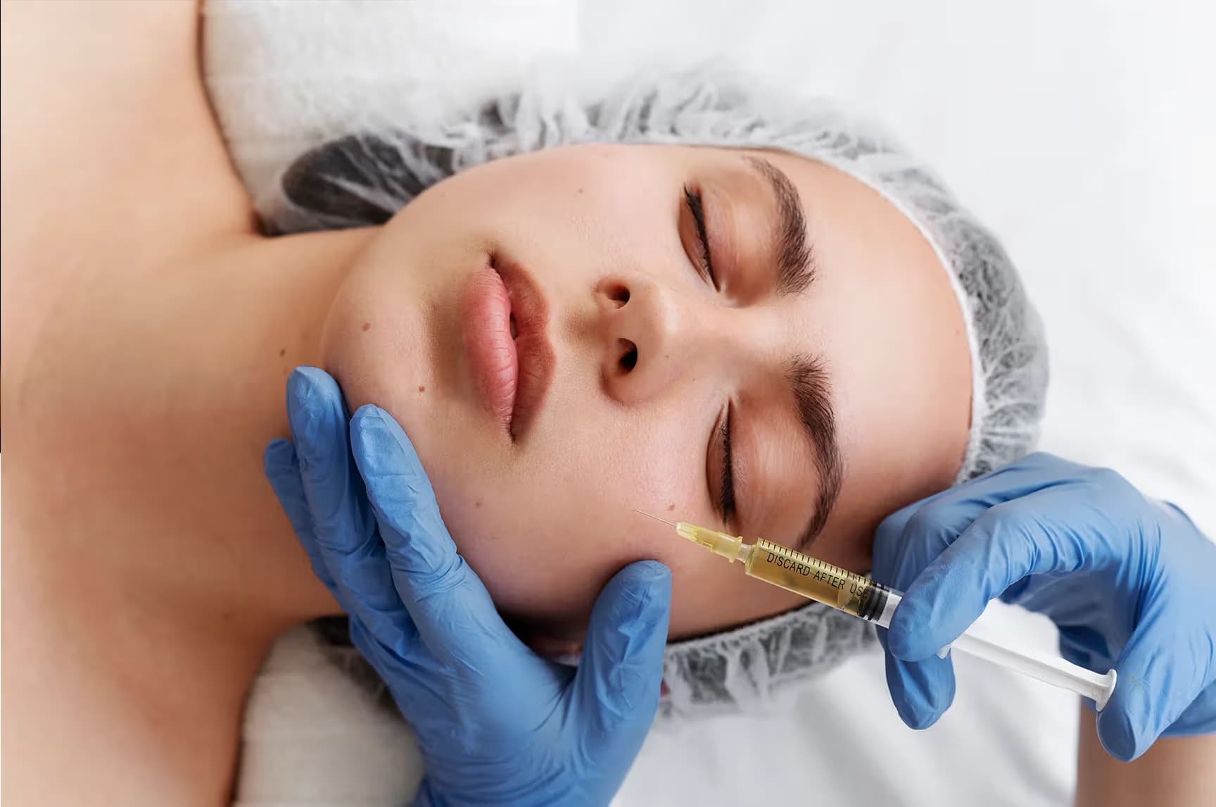 Anti-aging treatments demonstration showing a woman's face with circular callouts highlighting different skin areas