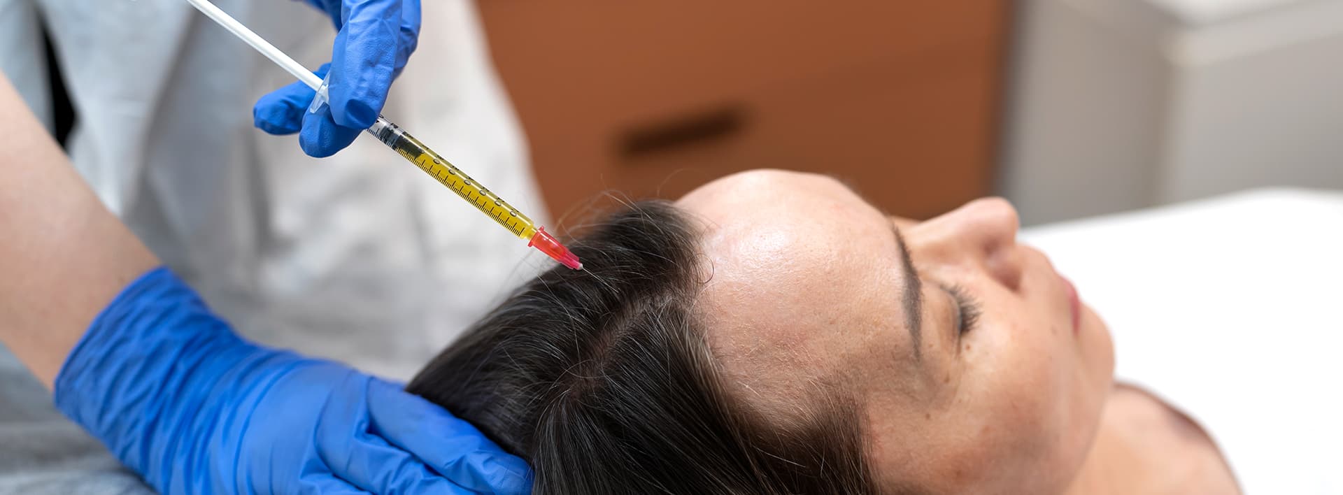 Anti-aging treatments demonstration showing a woman's face with circular callouts highlighting different skin areas